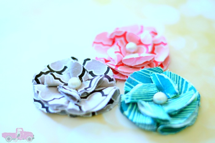 Want to learn how to make fabric flowers? Check out this Easy Fabric Flower Tutorial. You will want fabric flowers on all of your craft projects!